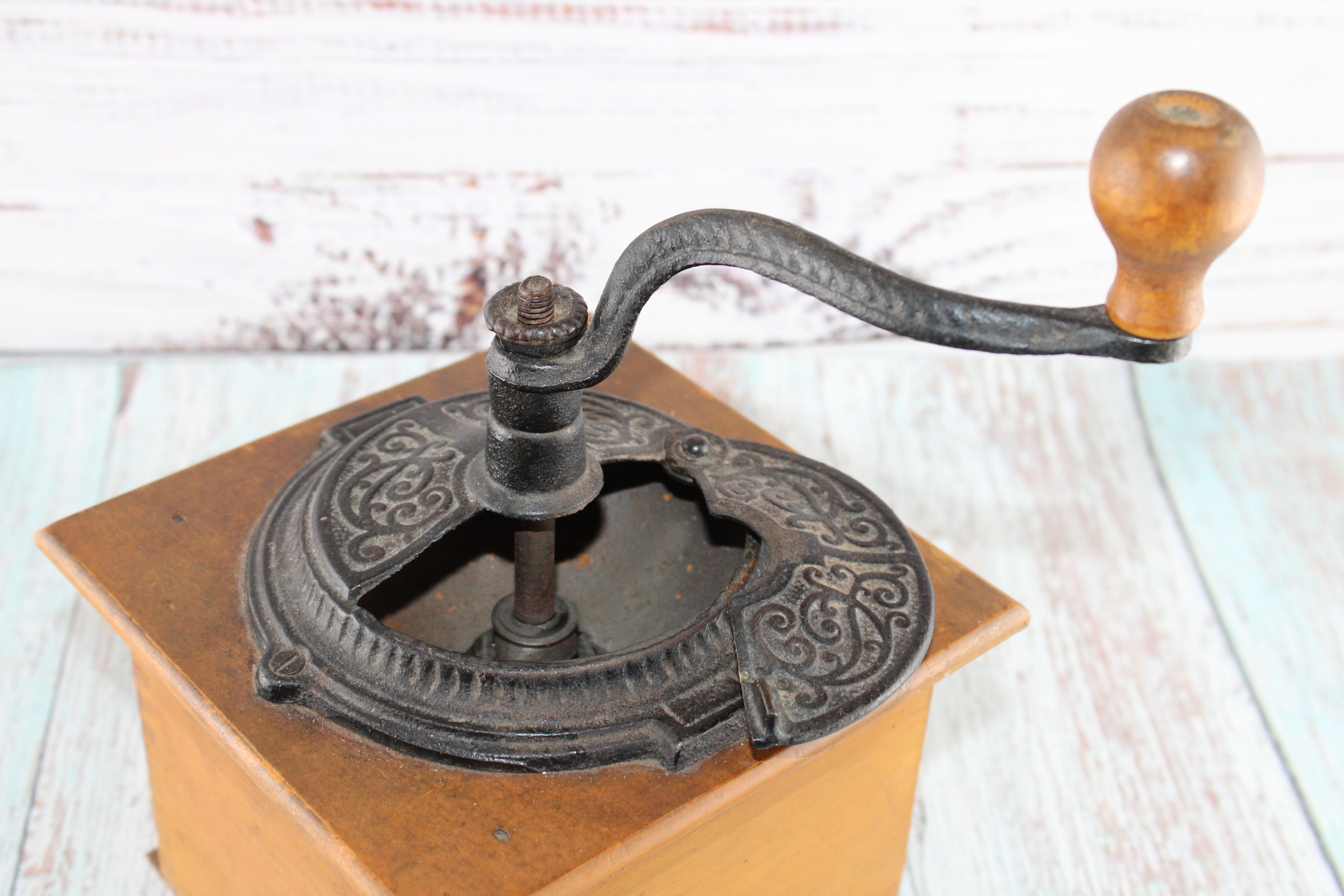 Antique manual coffee grinder